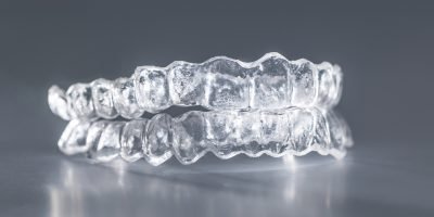 Inivisalign braces or aligner. A way to have a beautiful smile and white teeth.